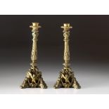 A PAIR OF GILT-METAL CANDLESTICKS, LATE 19TH CENTURY