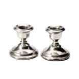 A PAIR OF ELIZABETH II SILVER CANDLESTICKS, COHEN AND CHARLES, BIRMINGHAM, 1966