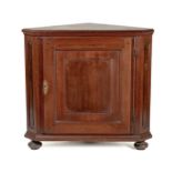 A CAPE TEAK CORNER CUPBOARD, 19TH CENTURY