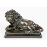AFTER ANTOINE LOUIS BARYE ( FRENCH 1795-1875): A BRONZE FIGURE OF A RECUMBENT LION