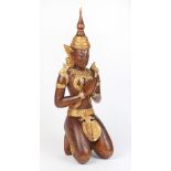 A SOUTH EAST ASIAN GILT-WOOD CARVINGÂ OF A DEITY