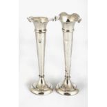 A PAIR OF SILVER VASES
