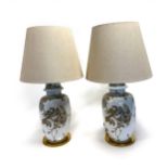 A PAIR OF PORCELAIN TABLE LAMPS