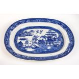 A COPELAND BLUE AND WHITE "WILLOW" PATTERN PLATTER, LATE 1800s