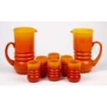 A PART-SUITE OF ORANGE AND YELLOW GLASSWARE