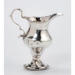 A GEORGE III SILVER MILK JUG, MAKERS MARKS RUBBED, LONDON, 1780