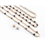 A MISCELLANEOUS GROUP OF THREE PEARL NECKLACES