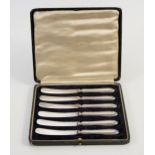 A GEORGE V CASED SILVER SET OF SIX BUTTER KNIVES, JOHN BIGGIN, SHEFFIELD, 1919