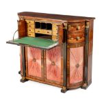 A REGENCY ROSEWOOD AND BRASS INLAID SECRETAIRE