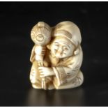 A JAPANESE BONE "DAIKOKU" NETSUKE, MEIJI PERIOD, 1868 - 1912