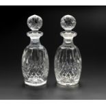 A PAIR OF WATERFORD 'LISMORE' CONNOISSEUR ROUND DECANTERS