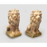 A PAIR OF LARGE TERRACOTTA GARDEN LIONS