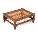 A WALNUT FOOT STOOL