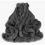 A VINTAGE WOOL PASHMINA WITH FUR TRIM