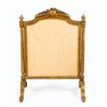 A VICTORIAN GILTWOOD FIRE SCREEN