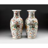 A MATCHED PAIR OF CHINESE FAMILLE ROSE 'DRAGON AND PHOENIX' VASES, REPUBLIC PERIOD, 1912 - 1949