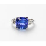 A TANZANITE AND DIAMOND RING