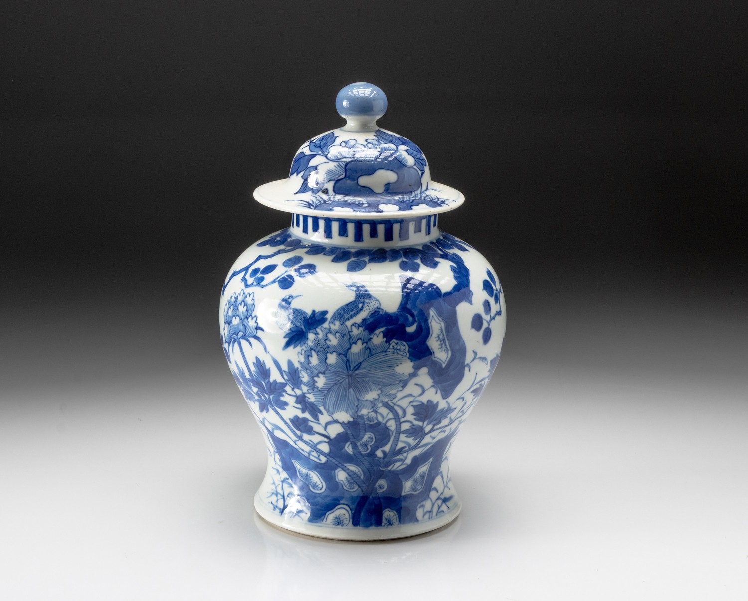 A CHINESE BLUE AND WHITE "SONGBIRD AND PEONY" JAR AND COVER, QING DYNASTY, 19TH CENTURY