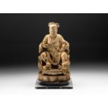 A CHINESE CYPRESS WOOD, BAIMU, CARVING OF A TAOIST DEITY, POSSIBLY WANG YE, MING DYNASTY, 1368 - 164