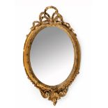 A VICTORIAN GILT MIRROR