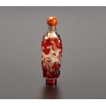A CHINESE RUBY-RED OVERLAY CLEAR GLASS SNUFF BOTTLE, QING DYNASTY, LATE 19TH CENTURY