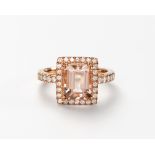 A MORGANITE AND DIAMOND RING