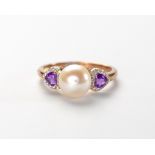 A PEARL, AMETHYST AND DIAMOND RING