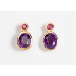 A PAIR OF AMETHYST AND RUBY EARRINGS