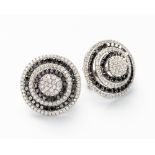 A PAIR OF BLACK AND WHITE DIAMOND EARRINGS