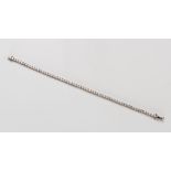 A DIAMOND TENNIS BRACELET