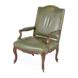 A VICTORIAN MAHOGANY AND LEATHER UPHOLSTERED ARMCHAIR