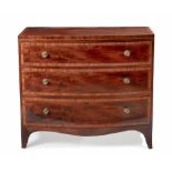 A GEORGE III BOWFRONT MAHOGANY CHEST OF DRAWERS