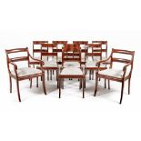 A SET OF TEN REGENCY STYLE MAHOGANY DINING CHAIRS