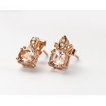 A PAIR OF MORGANITE AND DIAMOND EARRINGS