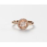 A MORGANITE AND DIAMOND RING