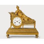 A FRENCH GILT BRONZE MADAME RECAMIER MANTEL CLOCK