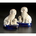 A PAIR OF STAFFORDSHIRE CONFETTI POODLES, MID 19TH CENTURY