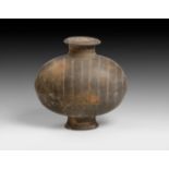 A CHINESE GREY POTTERY "COCOON" JAR, HAN DYNASTY, 206 BC - 220 AD