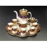 AN AYNSLEY PORCELAIN DEMITASSE SUITE, EARLY 20TH CENTURY