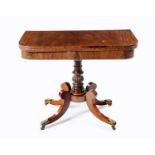 A REGENCY MAHOGANY TEA TABLE