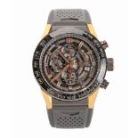 A GOLD AND TITANIUM WRISTWATCH, TAG HEUER CALIBRE 01 BLACK SKELETON