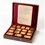 A CASED SET OF GOLD STAMPS