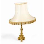 A BRASS TABLE LAMP AND SHADE