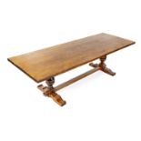 AN OAK REFECTORY  STYLE TABLE