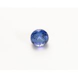 AN UNMOUNTED ROUND-CUT TANZANITE