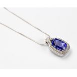 A TANZANITE AND DIAMOND PENDANT