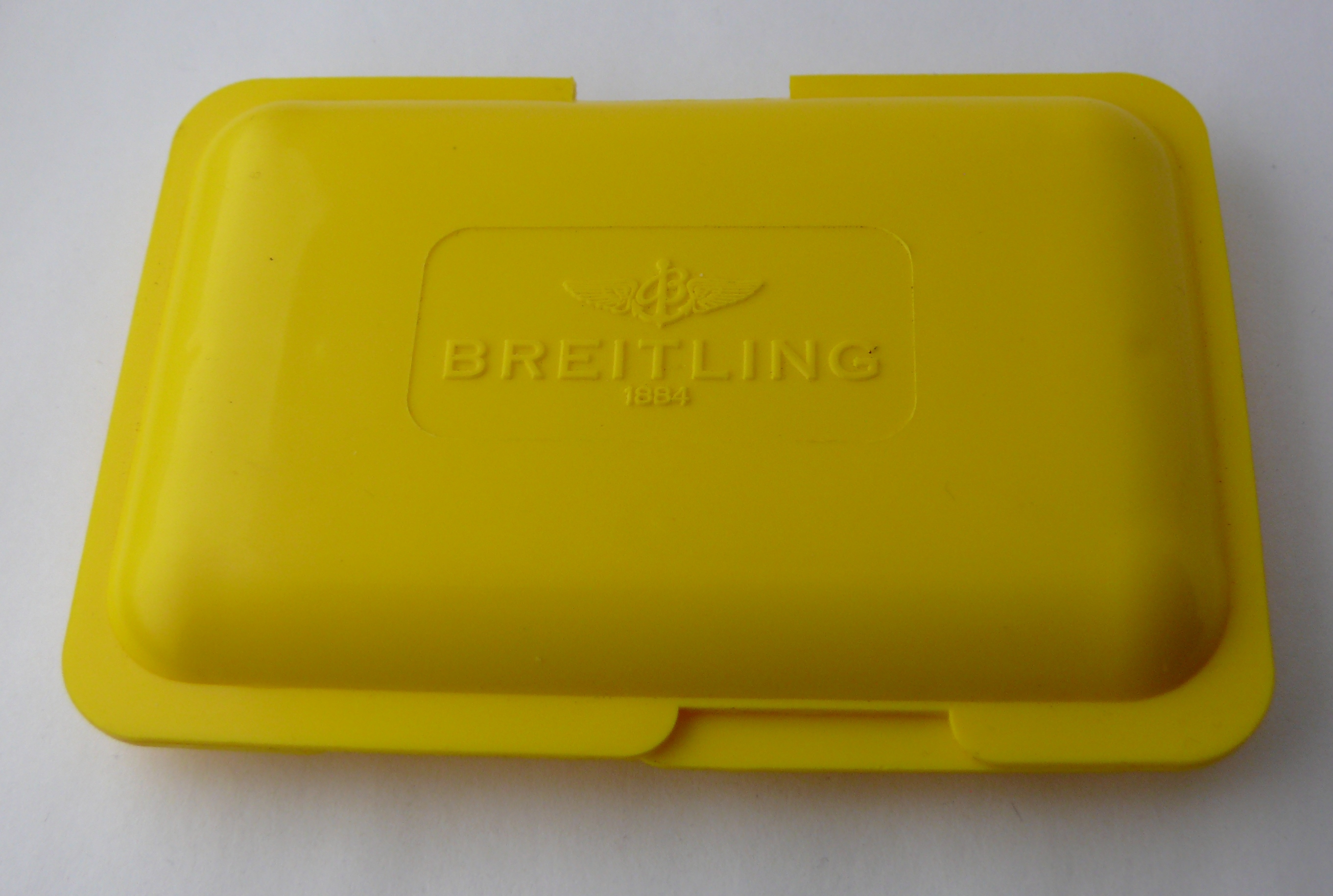 Vintage Breitling Parts Box. Box is clean with some marks that commensurate general wear.