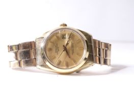 ROLEX OYSTER PERPETUAL DATE GOLD PLATED WATCH CIRCA 1980 REFERENCE 1550, circular champagne dial