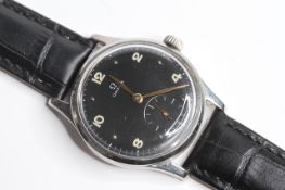 VINTAGE OMEGA 30T2 MANUAL WIND WATCH, circular black dial with arabic and dot hour markers,