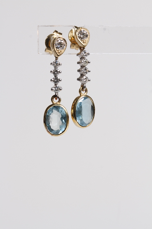 18ct Aquamarine and diamond long drop earrings, in 18ct yellow and white gold
